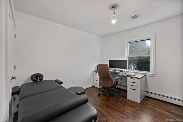 a room with furniture and a window