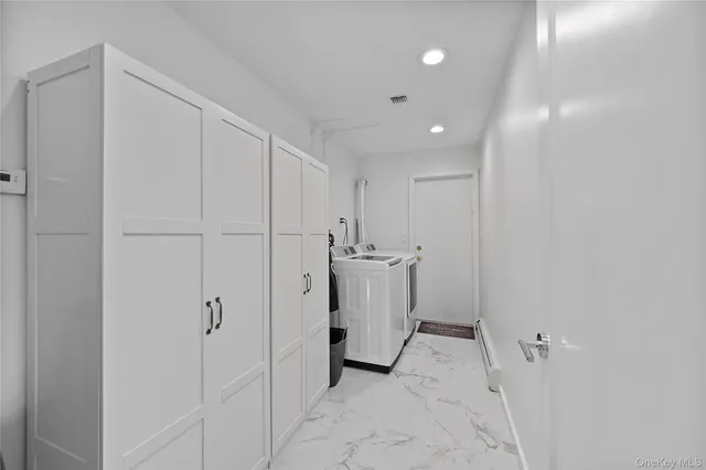 a bedroom with a workspace