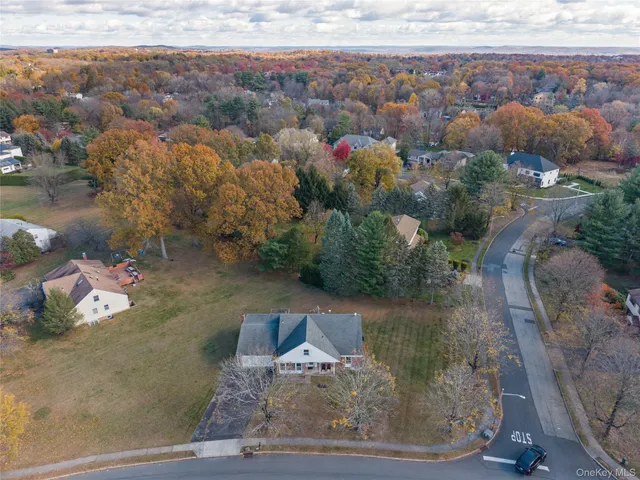 a view of a large body of water with a building in the background