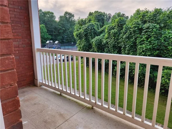 a view of outdoor space with garden and deck