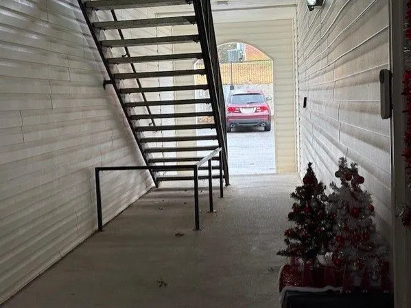 a view of entryway with a front door