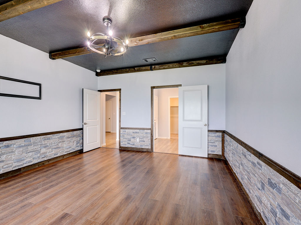 1716 Frontenac Street Leander, TX 78641 - Photo 17 of 34 a view of a livingroom with wooden floor