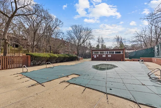 a view of a building with a bench in front of it