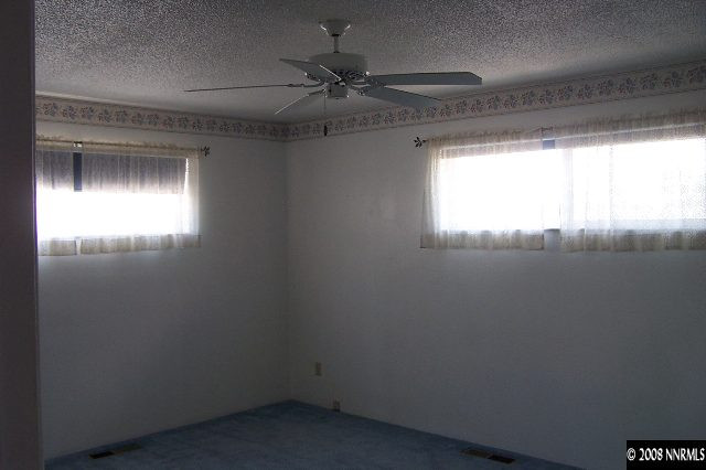 1952 South Allen Road Fallon, NV 89406 - Photo 5 of 8 a view of an empty room and window