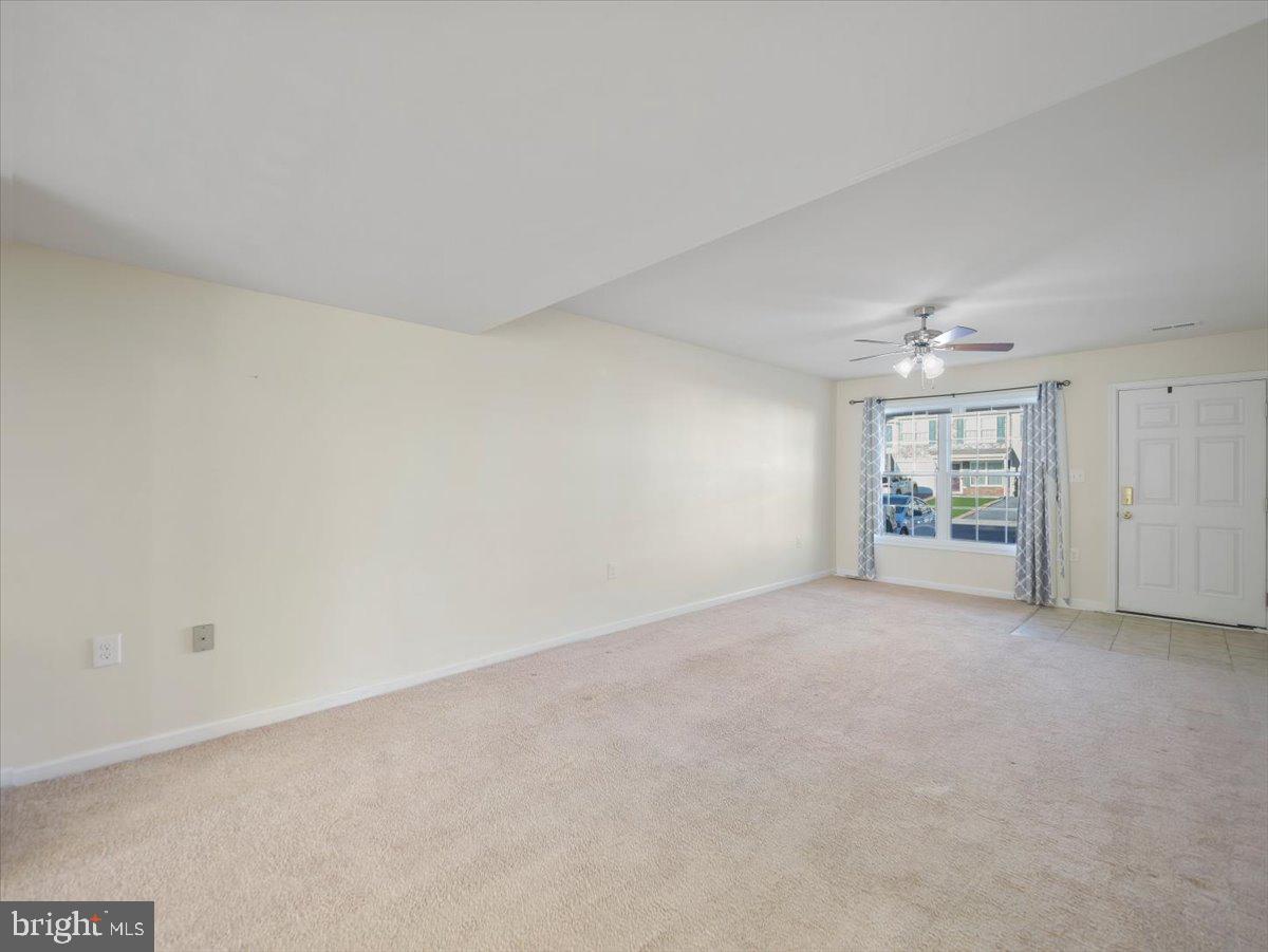 35 Montague Way Inwood, WV 25428 - Photo 17 of 38 wooden floor in an empty room