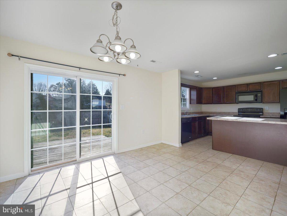 35 Montague Way Inwood, WV 25428 - Photo 25 of 38 a view of kitchen and windows
