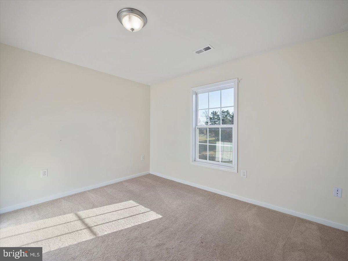 35 Montague Way Inwood, WV 25428 - Photo 32 of 38 an empty room with a window