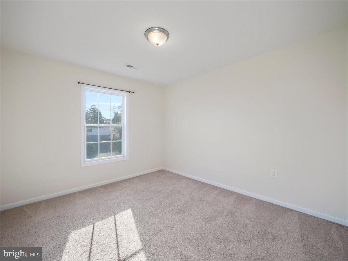 35 Montague Way Inwood, WV 25428 - Photo 34 of 38 an empty room with a window
