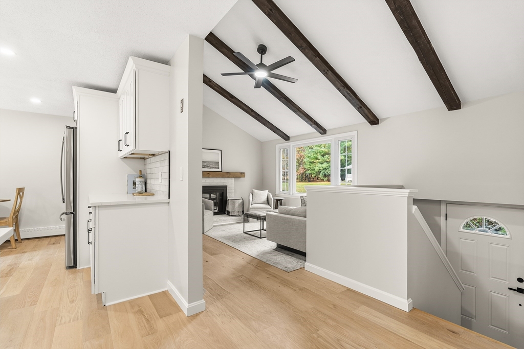 293 Mendall Road Acushnet, MA 02743 - Photo 16 of 41 a view of kitchen and livingroom with furniture