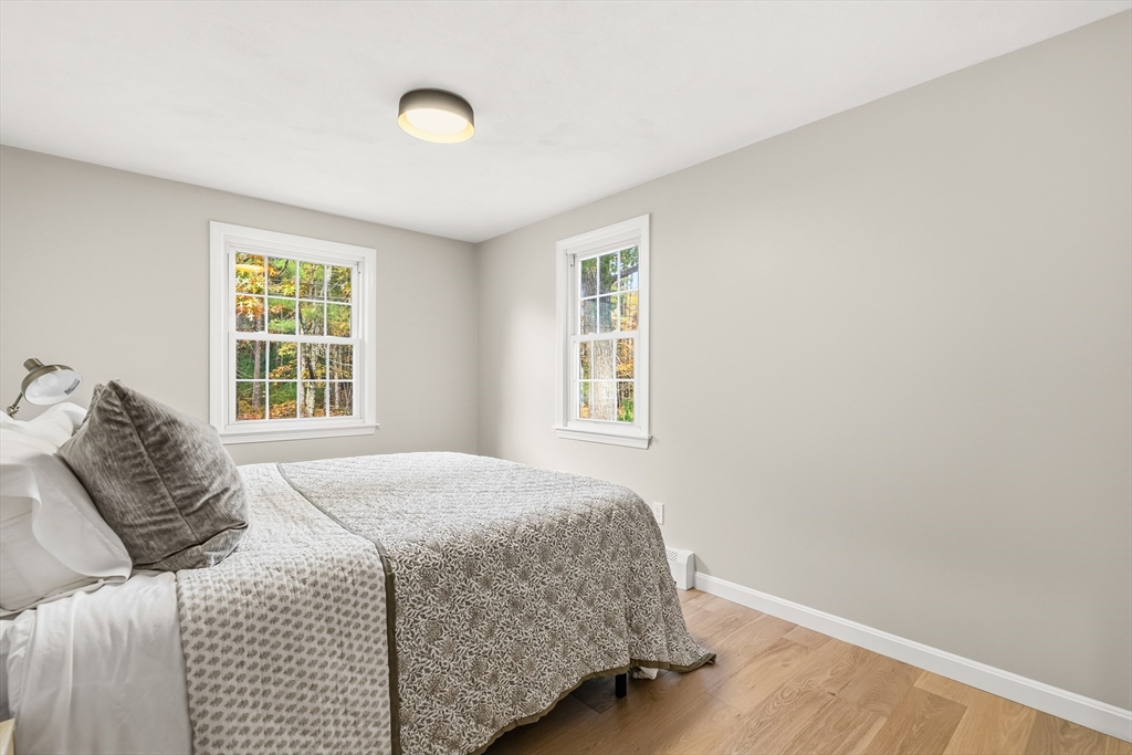 293 Mendall Road Acushnet, MA 02743 - Photo 19 of 41 a bedroom with a bed and a window