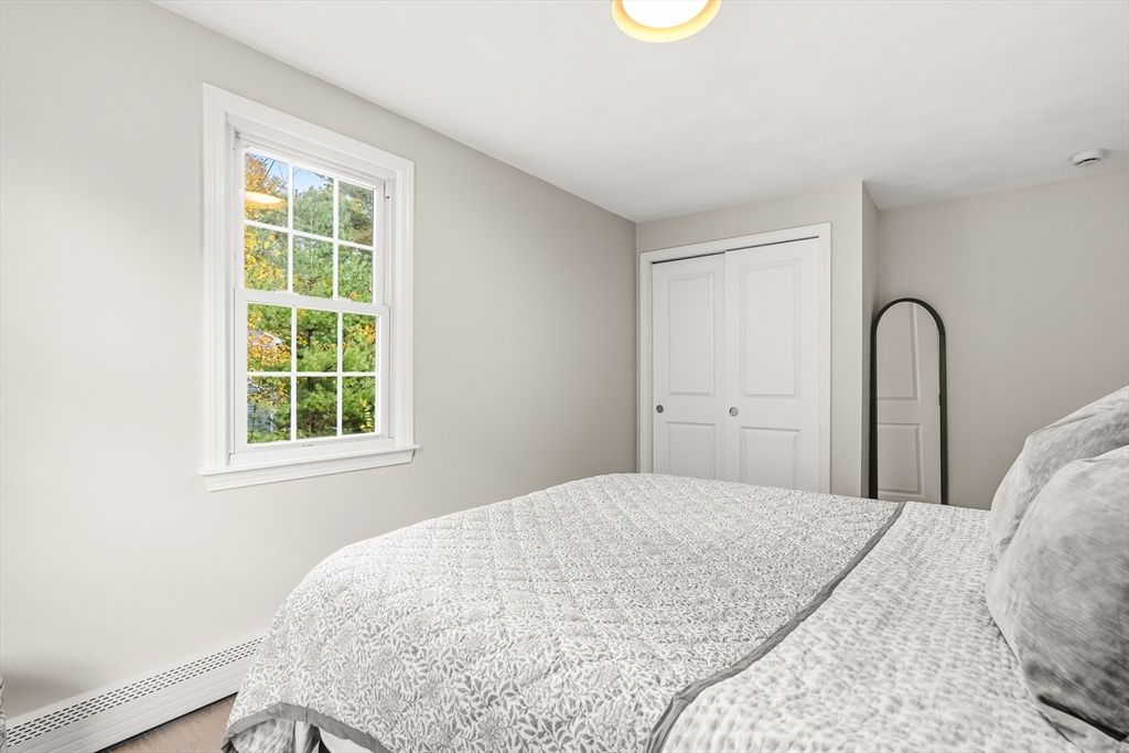 293 Mendall Road Acushnet, MA 02743 - Photo 20 of 41 a bedroom with a bed and a window