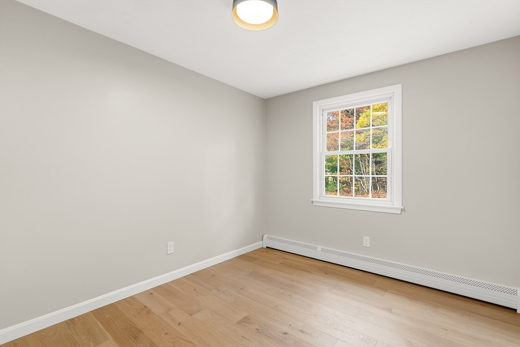 293 Mendall Road Acushnet, MA 02743 - Photo 21 of 41 an empty room with a window