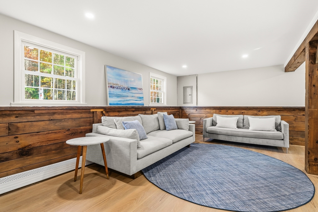 293 Mendall Road Acushnet, MA 02743 - Photo 26 of 41 a living room with furniture and a large window
