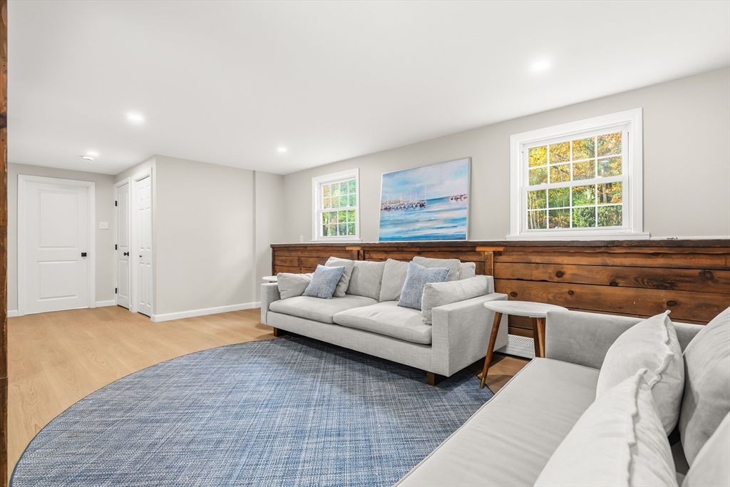293 Mendall Road Acushnet, MA 02743 - Photo 28 of 41 a living room with furniture and a large window