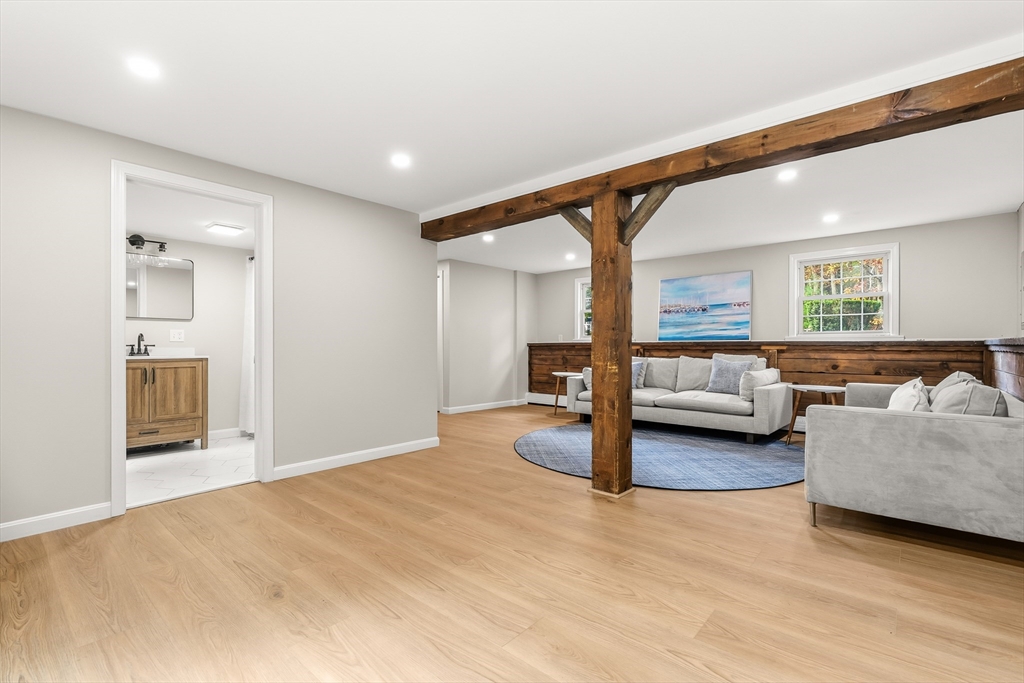 293 Mendall Road Acushnet, MA 02743 - Photo 31 of 41 a living room with furniture and a large window