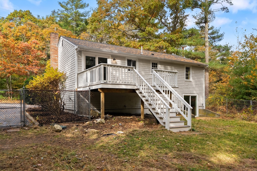 293 Mendall Road Acushnet, MA 02743 - Photo 35 of 41 a front view of a house with a yard