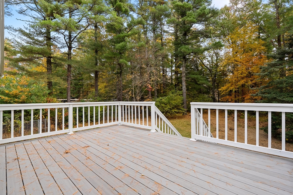 293 Mendall Road Acushnet, MA 02743 - Photo 38 of 41 a view of deck with wooden floor and fence