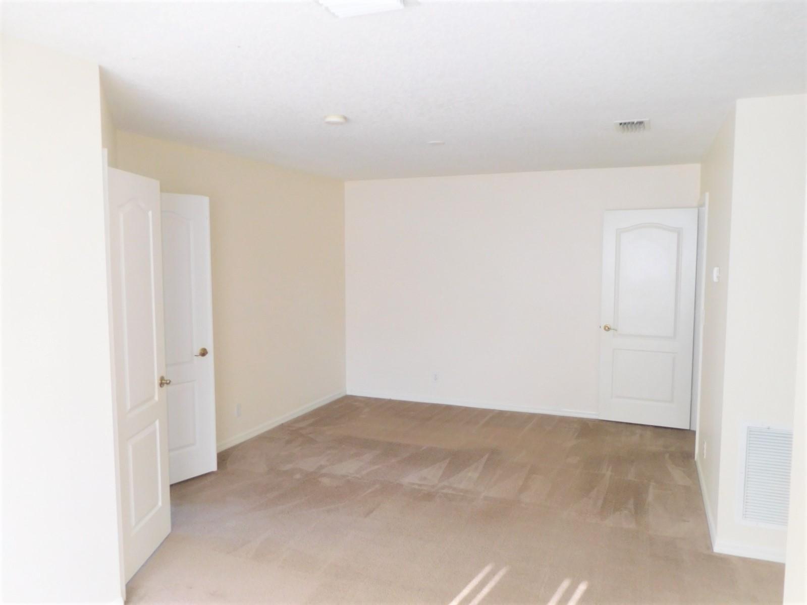 413 Northwest Canna Way, Unit 413 Stuart, FL 34994 - Photo 12 of 38 Upstairs bedroom 2