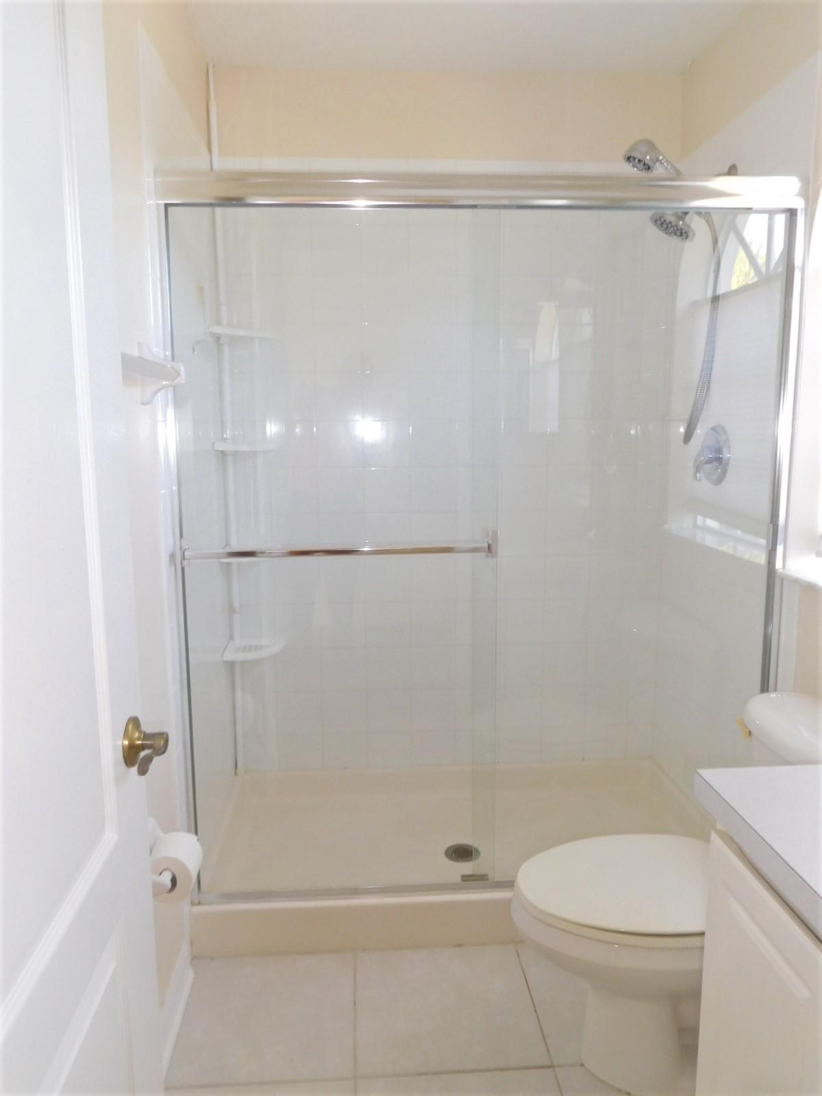 413 Northwest Canna Way, Unit 413 Stuart, FL 34994 - Photo 13 of 38 Upstairs bath
