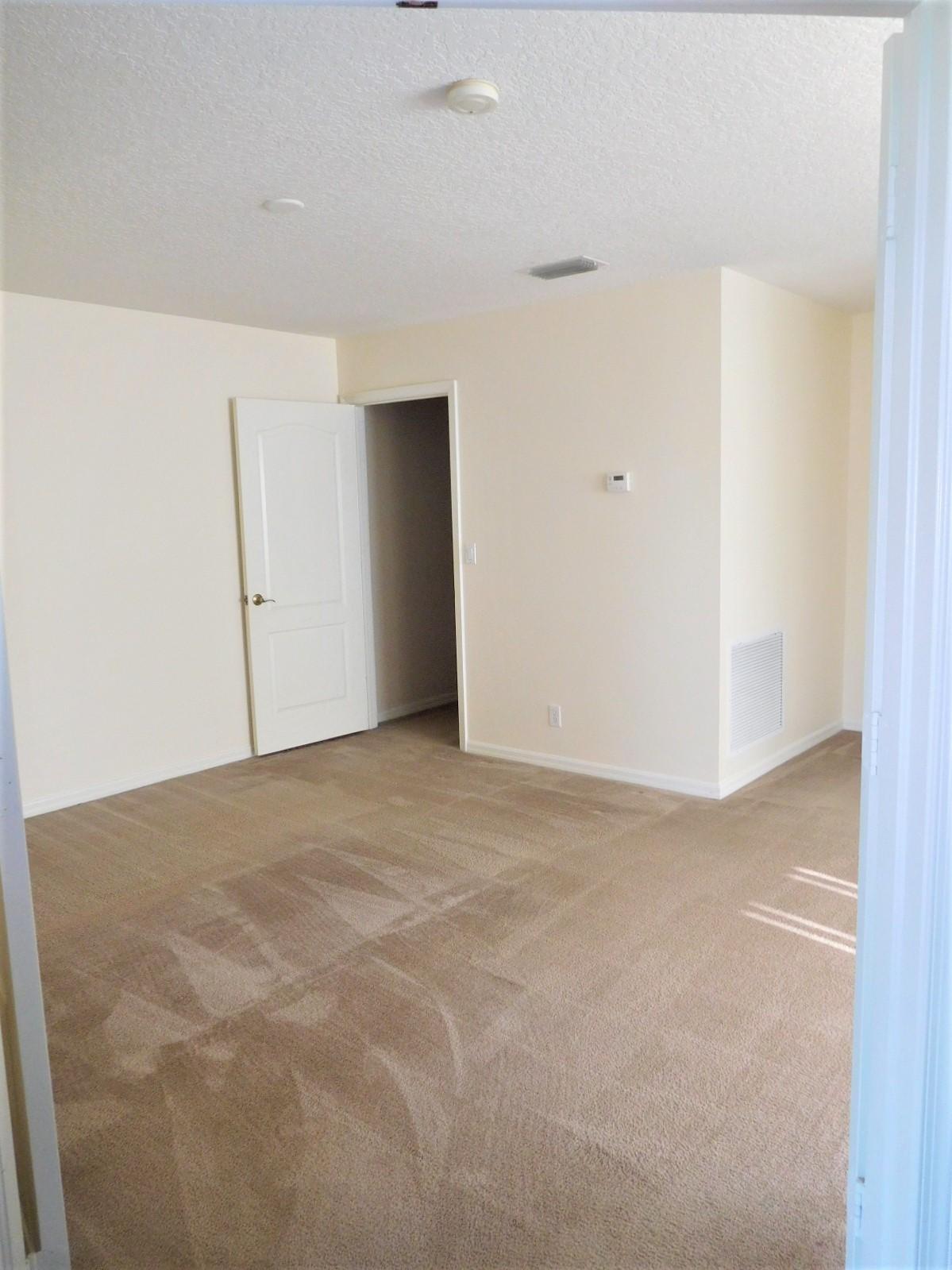 413 Northwest Canna Way, Unit 413 Stuart, FL 34994 - Photo 32 of 38 Upstairs bedroom