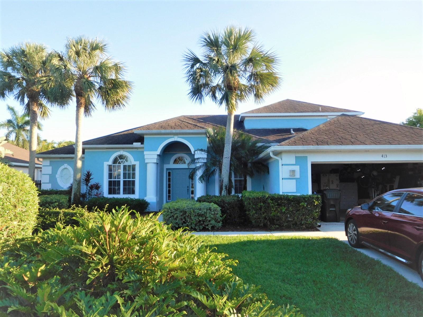 413 Northwest Canna Way, Unit 413 Stuart, FL 34994 - Photo 37 of 38 Front of house