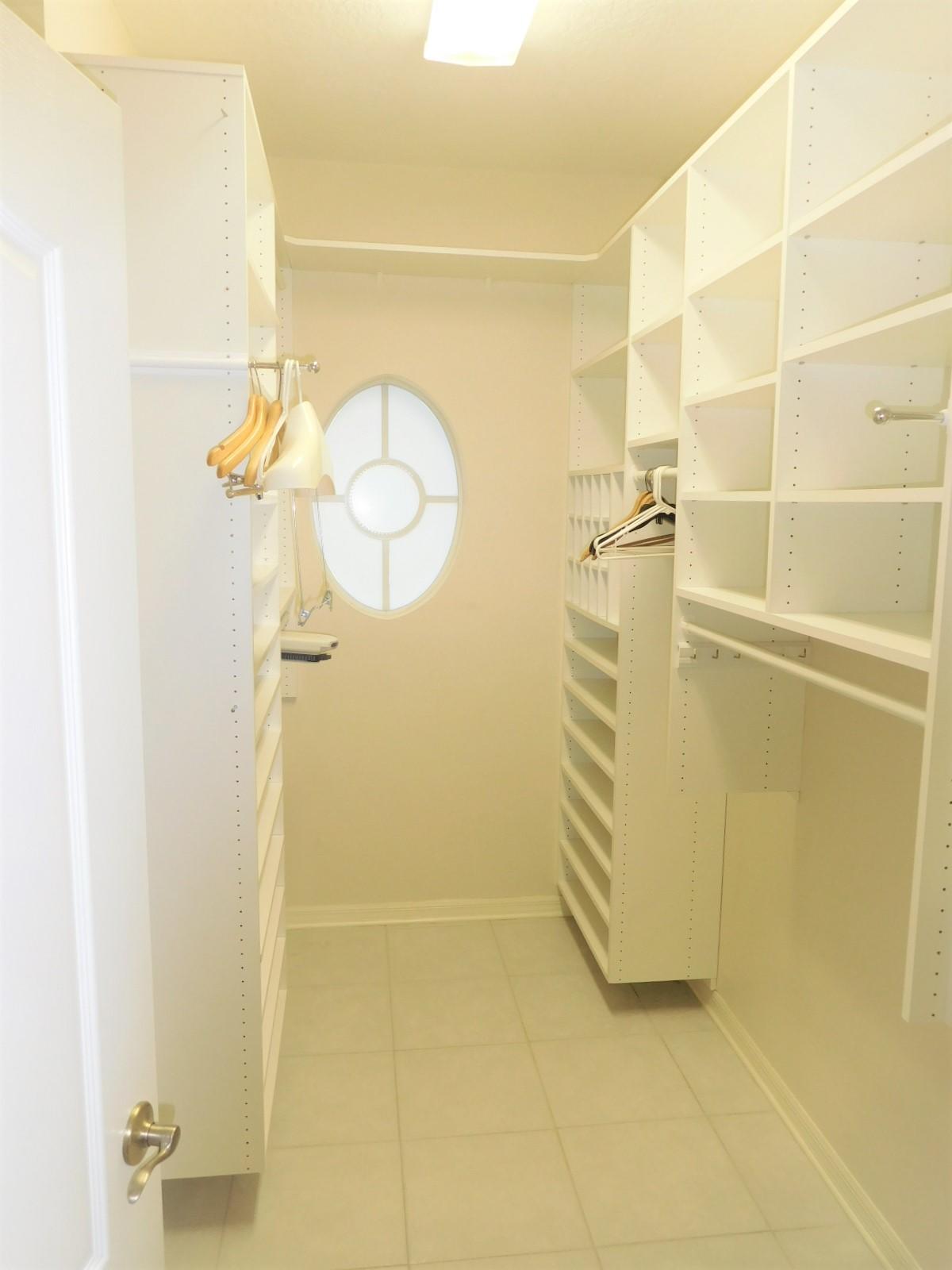413 Northwest Canna Way, Unit 413 Stuart, FL 34994 - Photo 9 of 38 Master closet