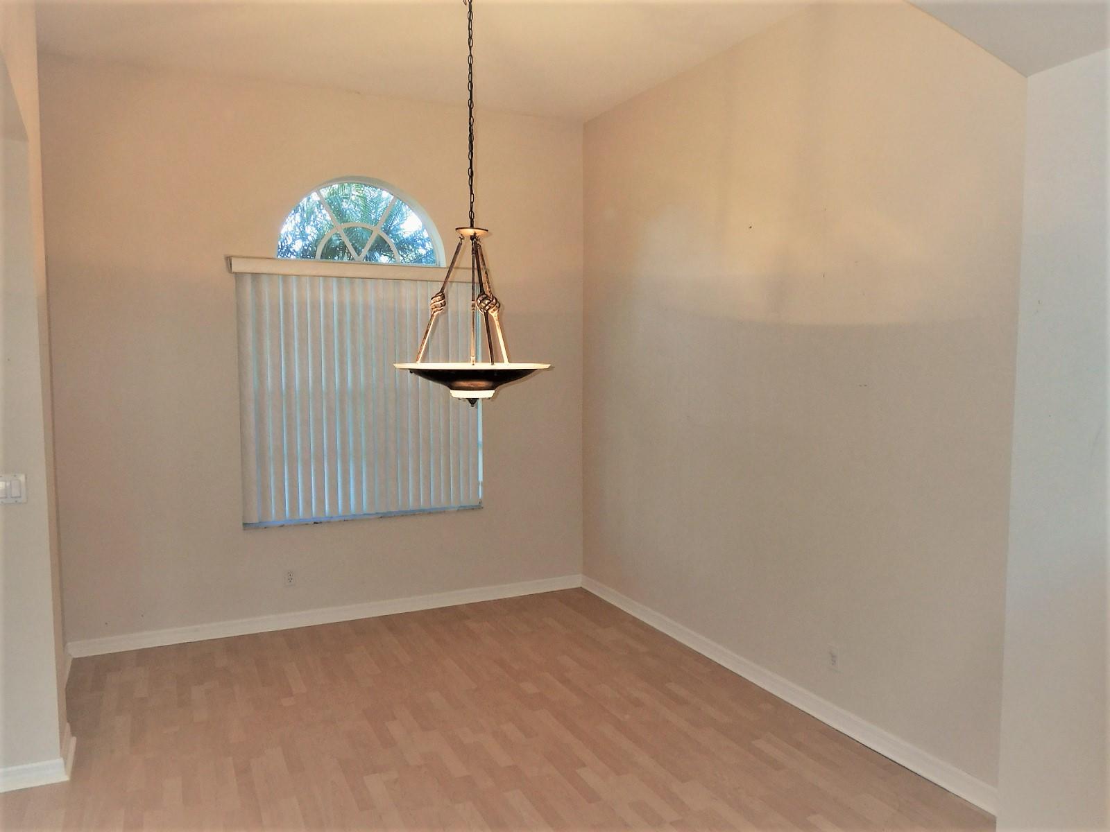 413 Northwest Canna Way, Unit 413 Stuart, FL 34994 - Photo 10 of 38 Formal dining area