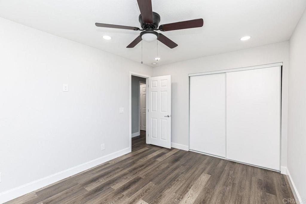 1020 41st Street San Diego, CA 92102 - Photo 12 of 39 a view of an empty room with wooden floor