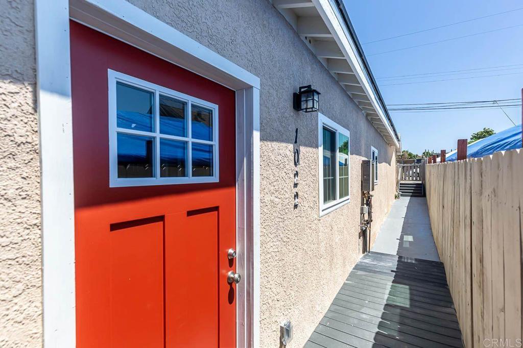 1020 41st Street San Diego, CA 92102 - Photo 15 of 39 a view of a brick house with wooden stairs