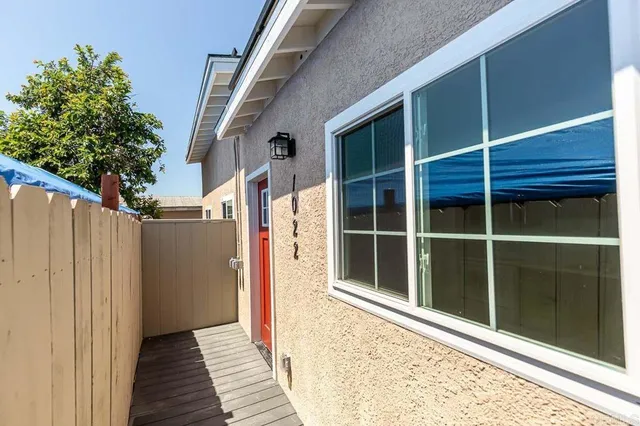 a view of a house with a large window