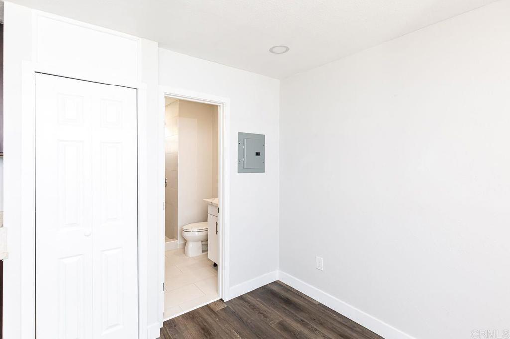 1020 41st Street San Diego, CA 92102 - Photo 22 of 39 a bathroom with a sink and a toilet