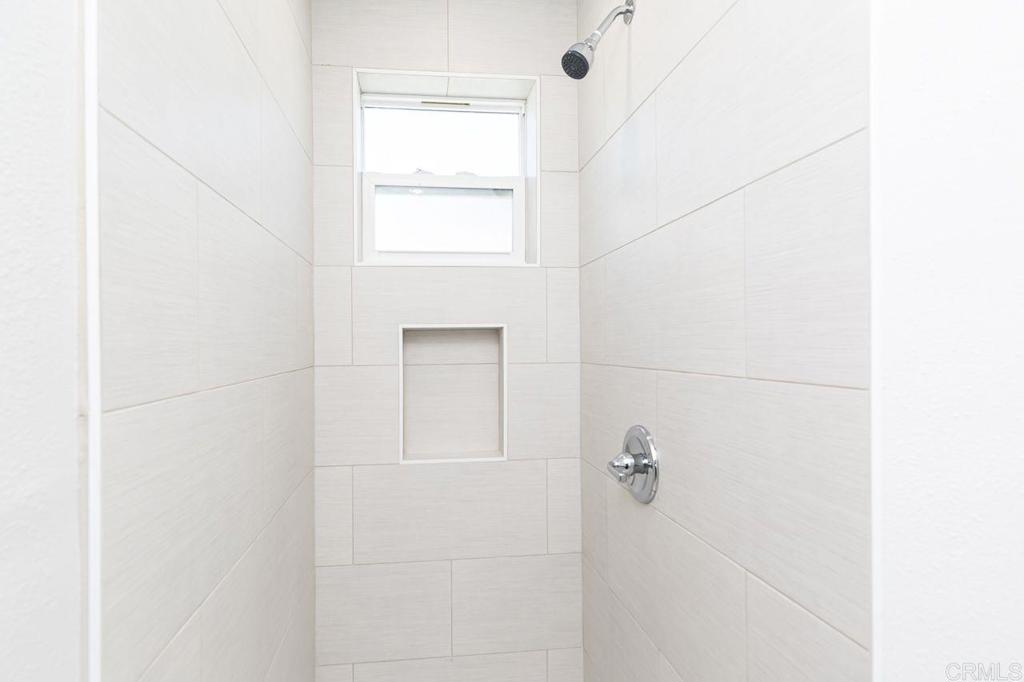1020 41st Street San Diego, CA 92102 - Photo 23 of 39 a bathroom with a bathtub