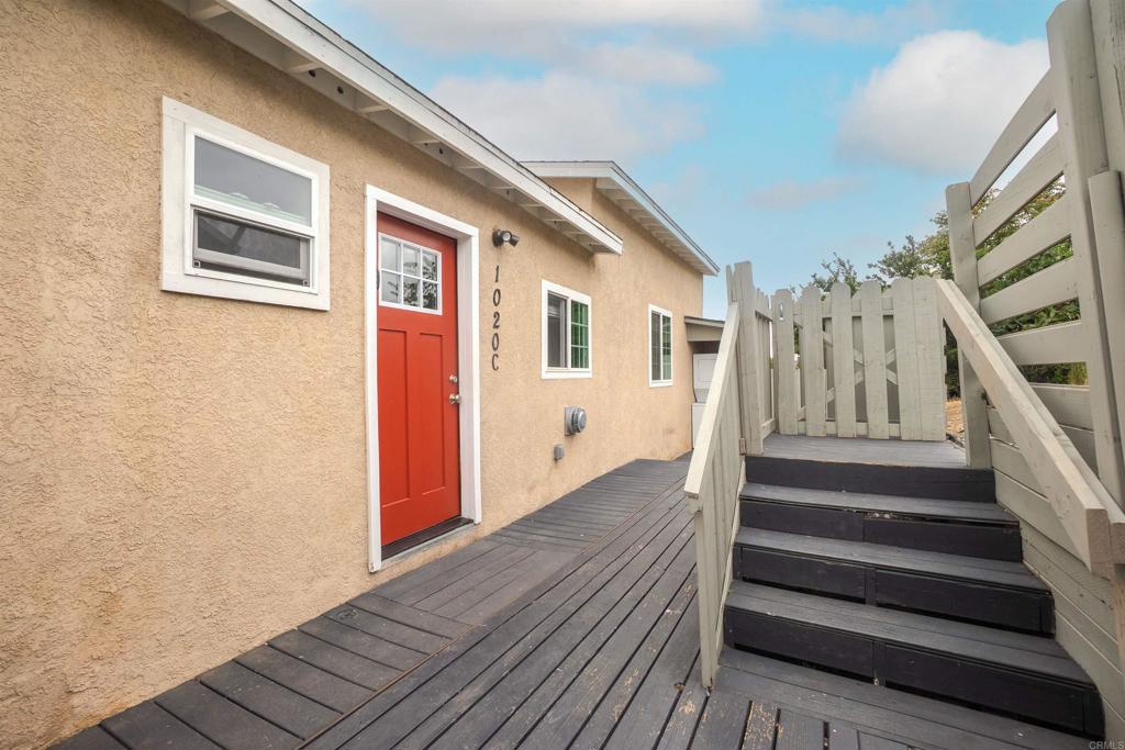 1020 41st Street San Diego, CA 92102 - Photo 25 of 39 a view of entryway with wooden floor and stairs