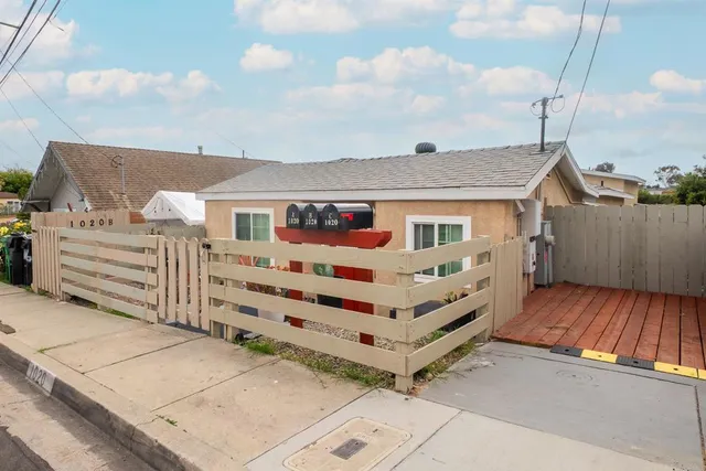 a front view of a house with balcony