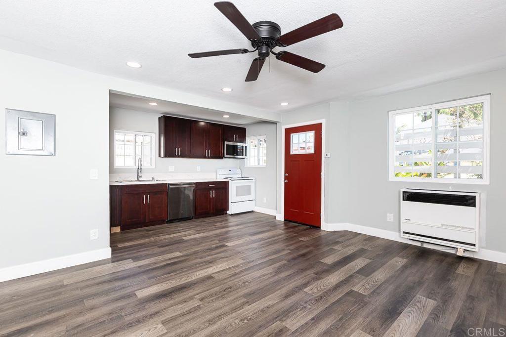 1020 41st Street San Diego, CA 92102 - Photo 5 of 39 a bedroom with furniture and a flat screen tv