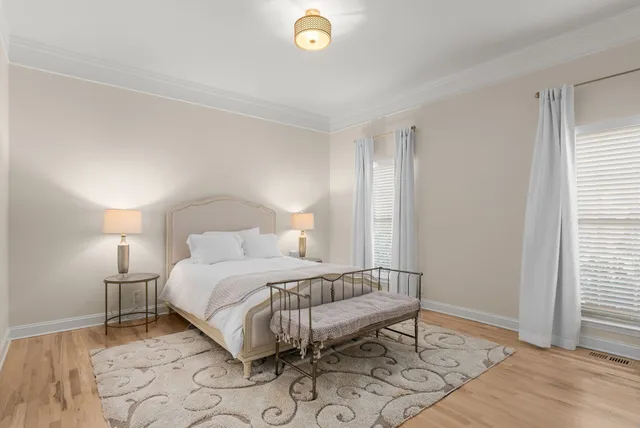 a bathroom with a shower sink and mirror
