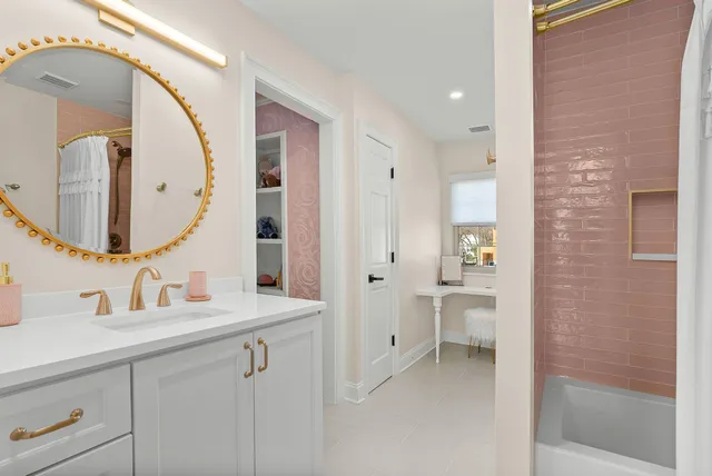 a spacious bedroom with a bed and window