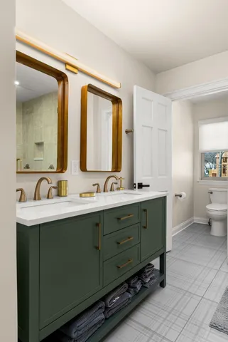 a view of a swimming pool with a table and chairs