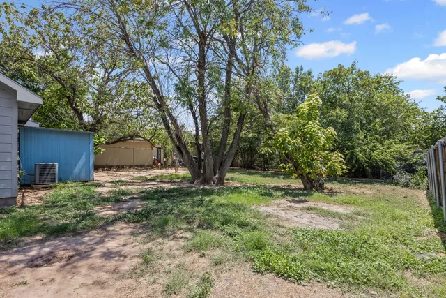 a view of backyard of house