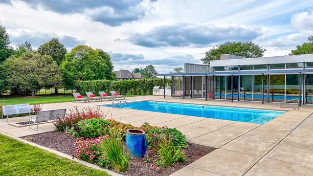 a view of a floor to ceiling window and an outdoor view