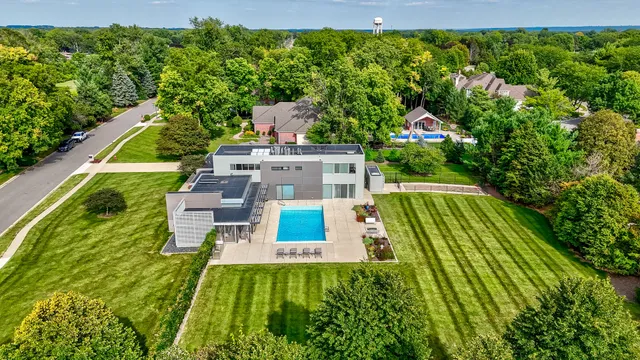 a view of a back yard with green space and plants