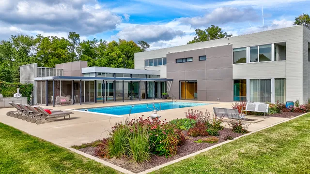 a front view of a house with an outdoor space