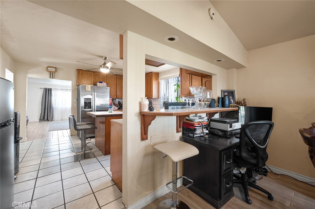 27447 Cypress Street Highland, CA 92346 - Photo 12 of 42 a view of a dining room with furniture