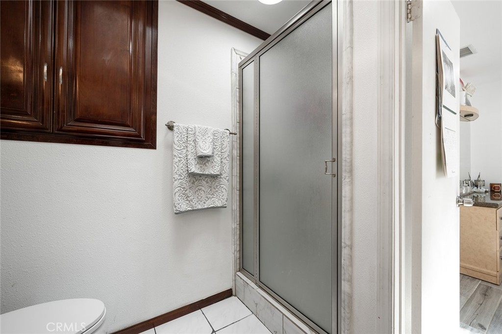 27447 Cypress Street Highland, CA 92346 - Photo 23 of 42 a bathroom with a toilet