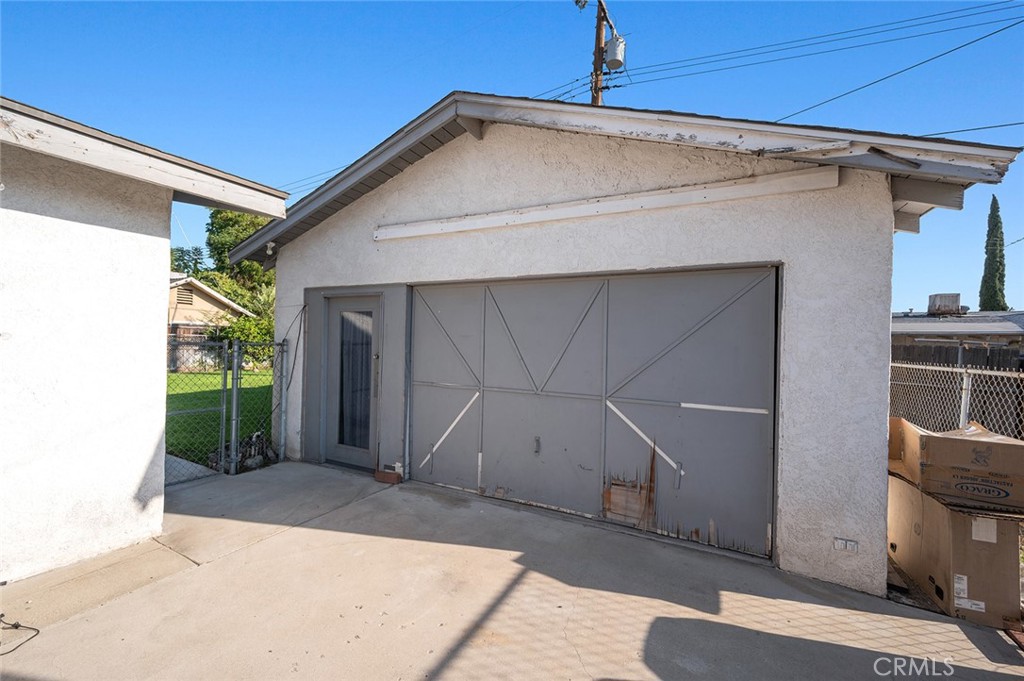 27447 Cypress Street Highland, CA 92346 - Photo 31 of 42 a view of a garage