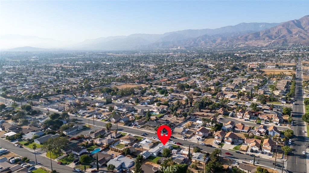 27447 Cypress Street Highland, CA 92346 - Photo 40 of 42 an aerial view of house with yard and mountain view