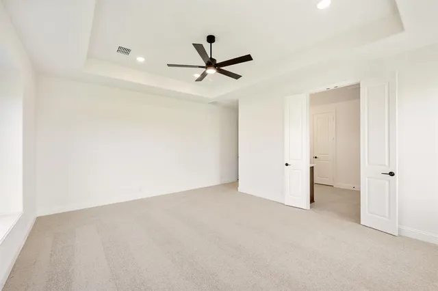 a bathroom with a shower and a tub