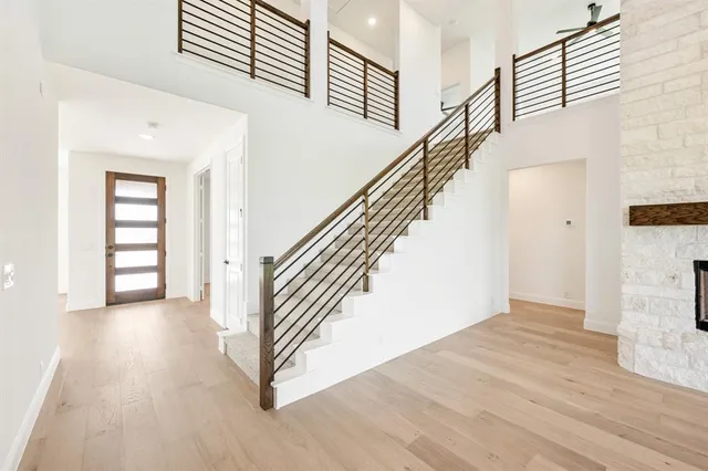 a view of empty room with ceiling fan
