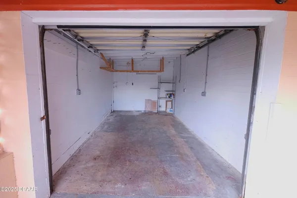 an aerial view of a house with outdoor space