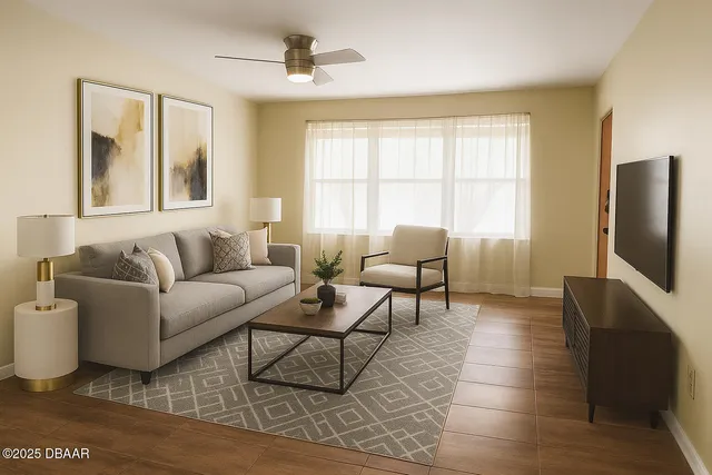 a living room with furniture and a flat screen tv